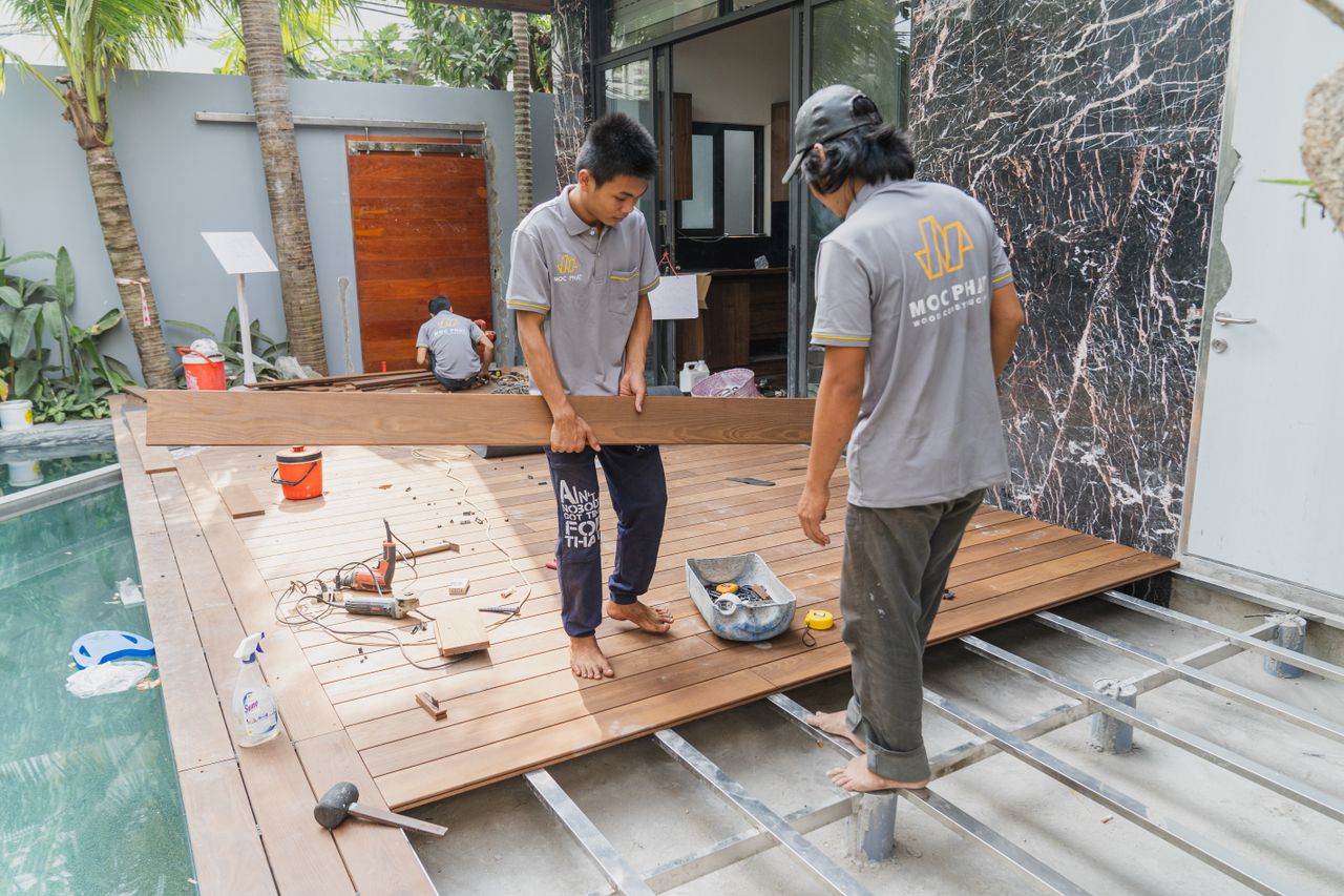 Flooring installation professionals at work